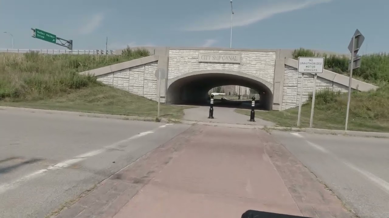 Honda Ruckus ride thru a park and a industrial wasteland