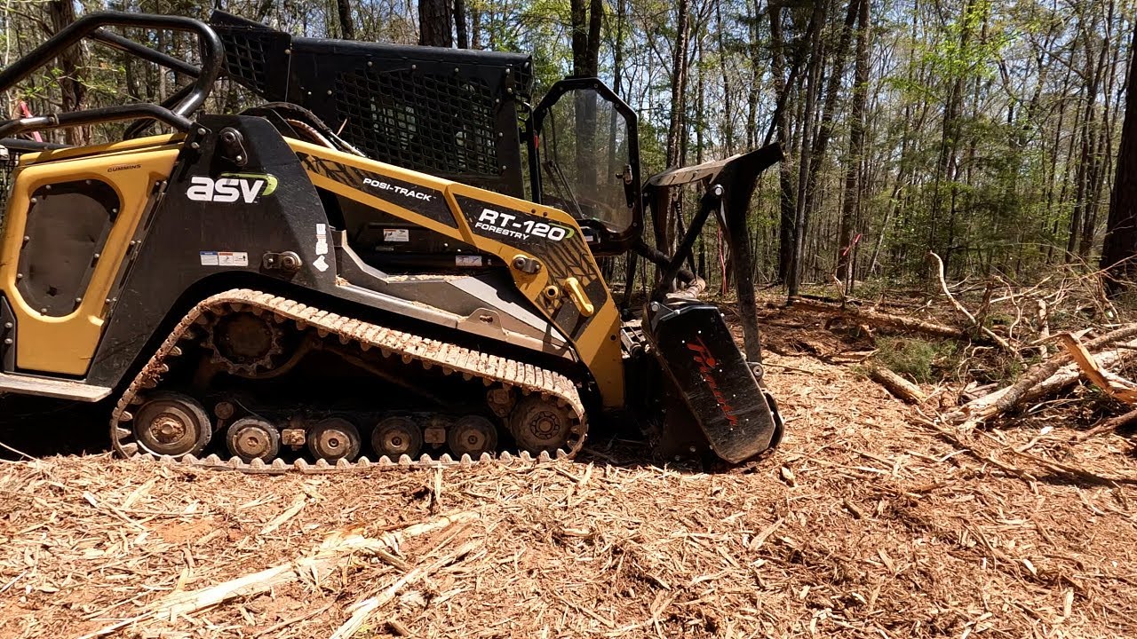 National Equipment Dealers on Site to Pair Prinoth 450s Mulching Head to ASV rt120 Forestry Machine