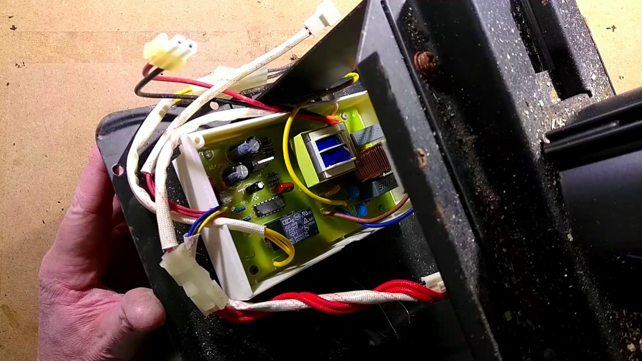 Fixing a Bradley smoker feed unit.