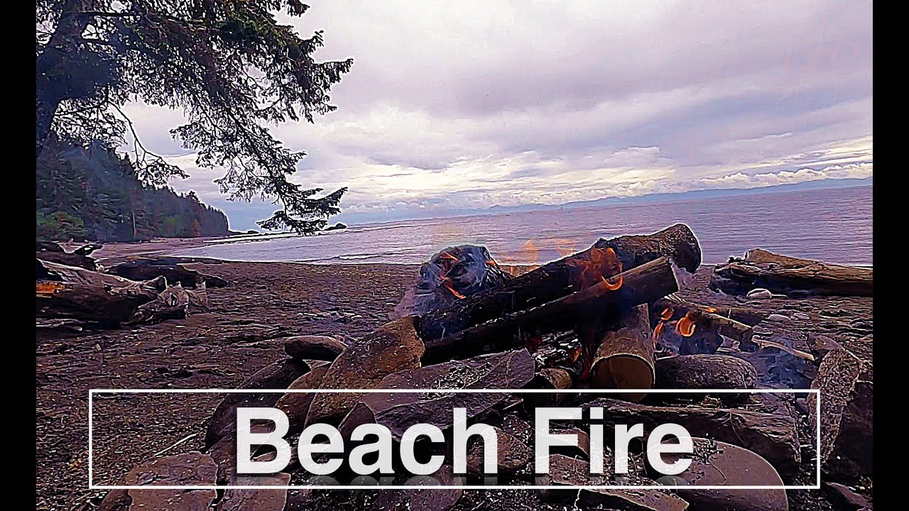 Campfire on the Beach with Ocean Waves