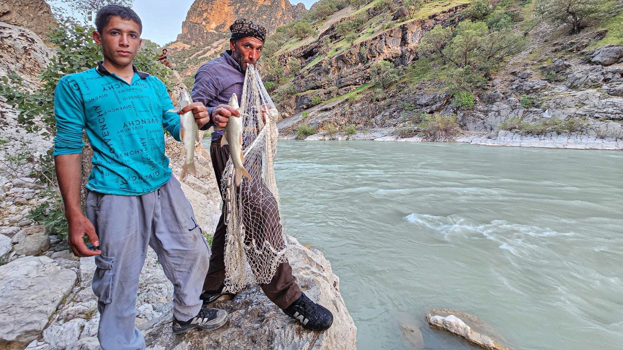 Nomadic men go fishing in a huge River (Iran 2023)