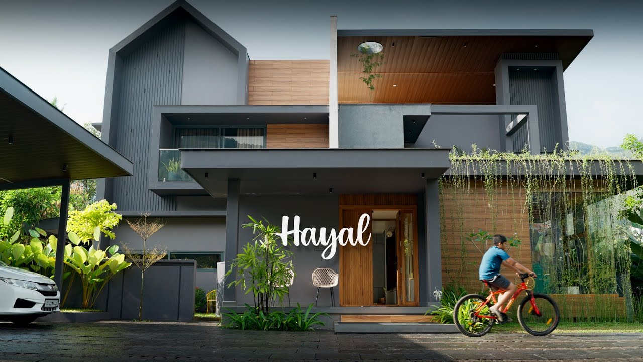 4000 sq. ft. of dark tones, warm spaces, and hillside living in Adimali