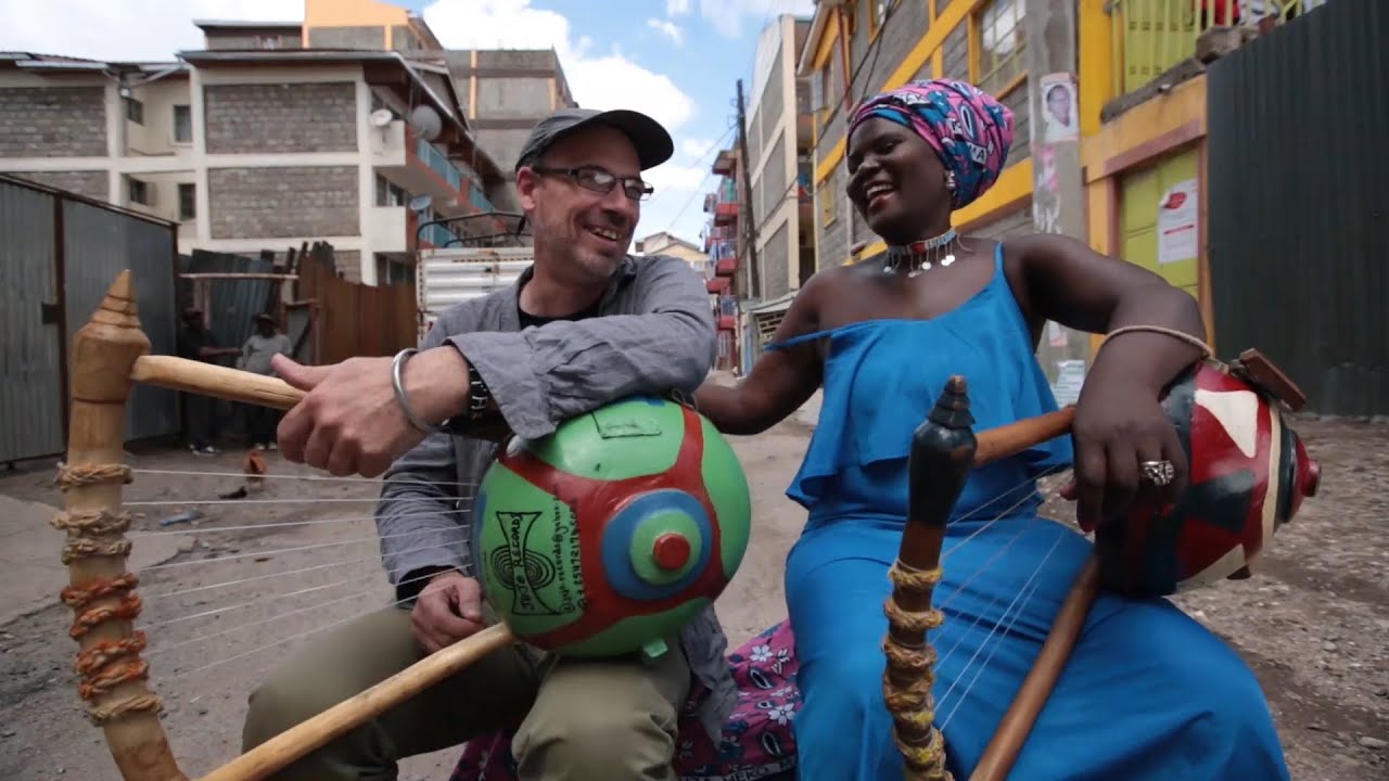 Judith Bwire with Pete Larson - music in the streets of Nairobi, 2017