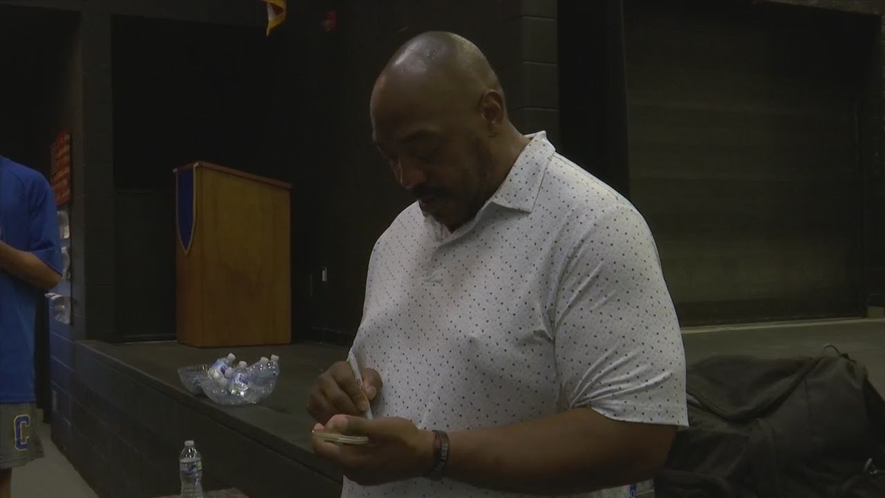 Former NFL linebacker Levon Kirkland speaks to Washington County student-athletes