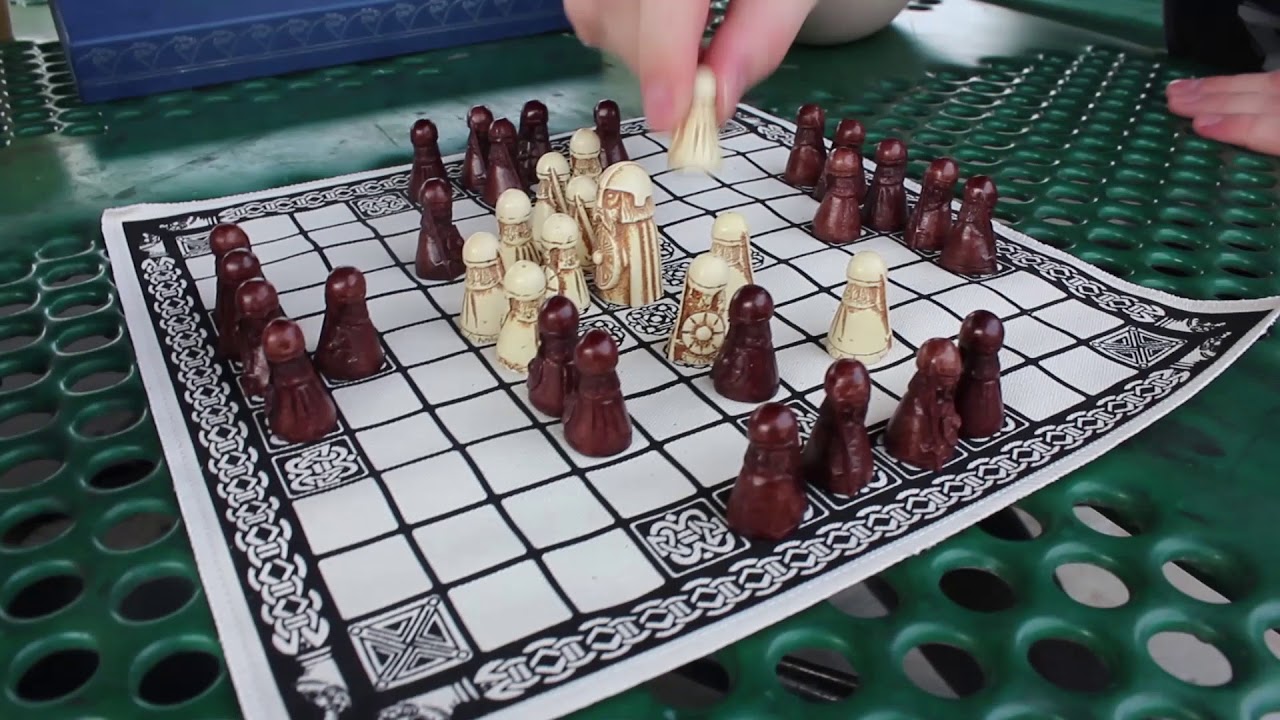 Playing Hnefatafl with Dog and Thimble
