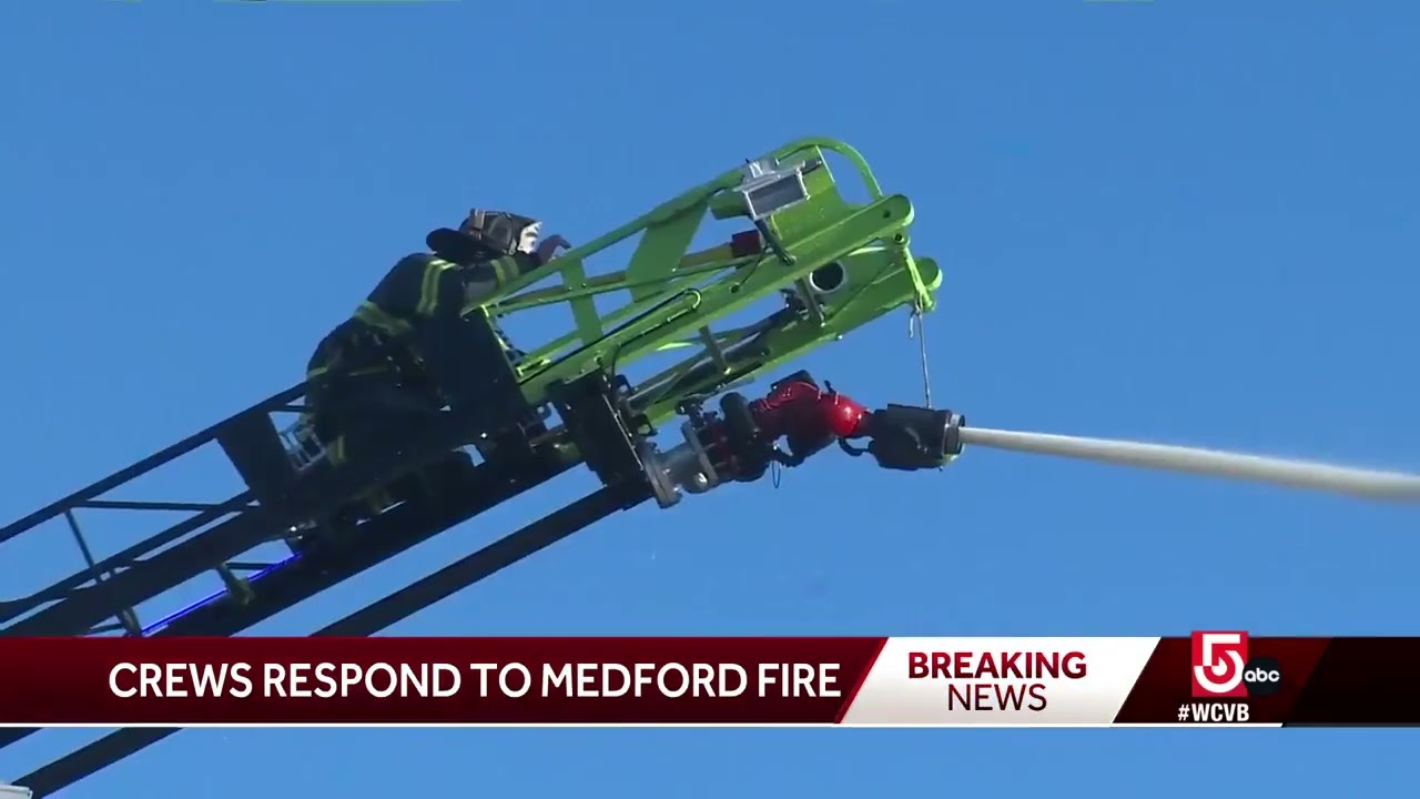 Crews battle fire in Medford