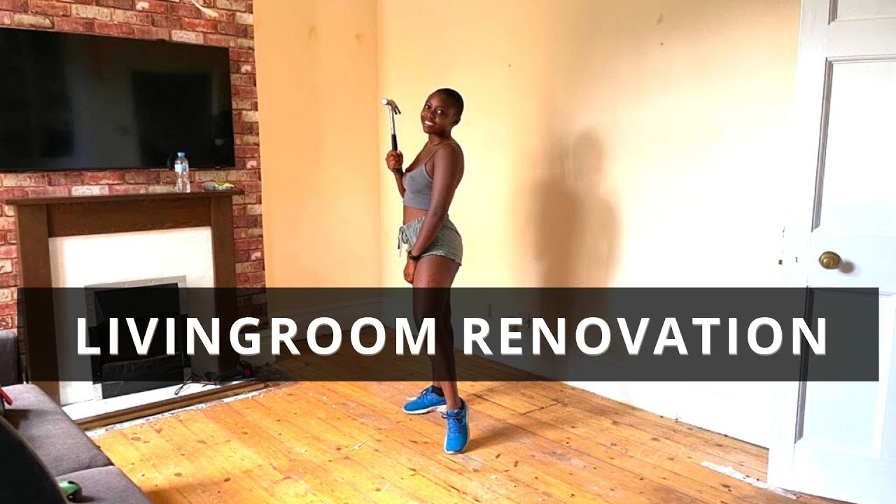 Living room renovations begin... ripping up carpet and tearing out the fireplace - many surprises!