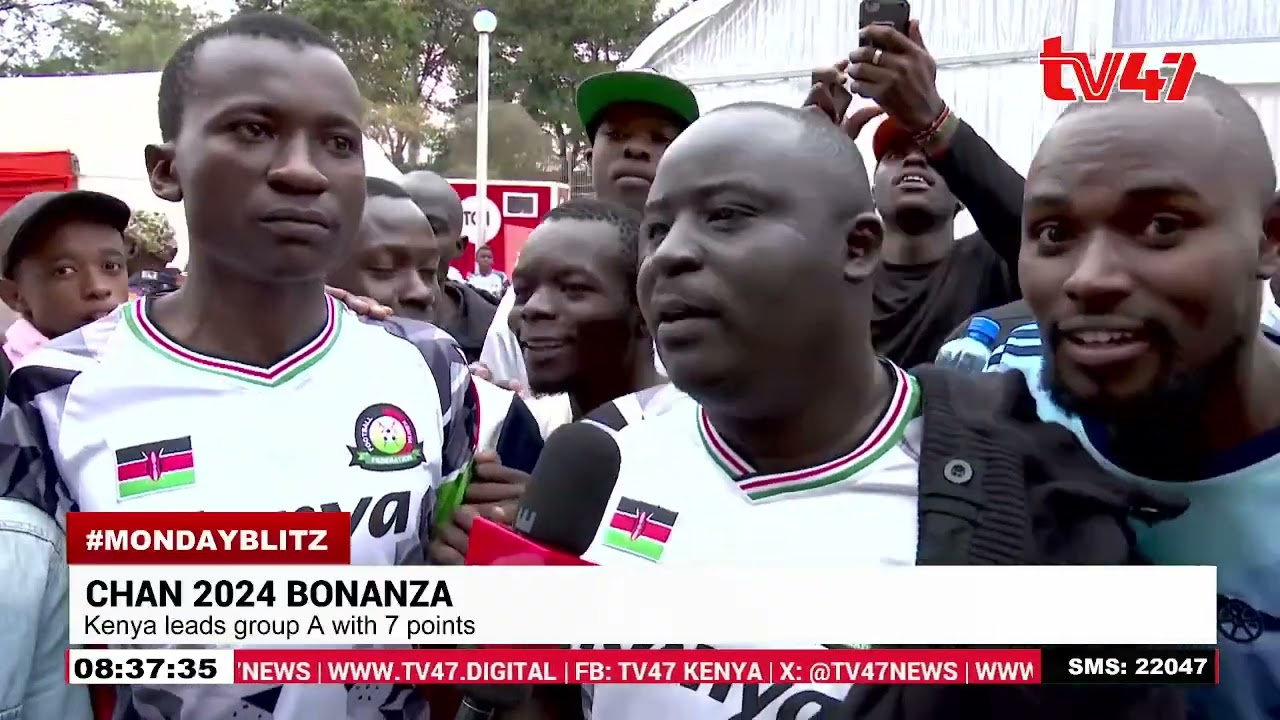 Kenyans at Kasarani Stadium react after the Harambee Stars win against Morocco
