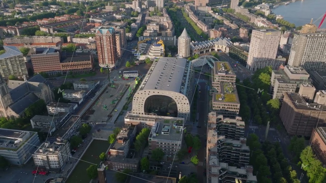 Rotterdam's Market Hall and its contemporary architecture from above. Aerial view captures iconic
