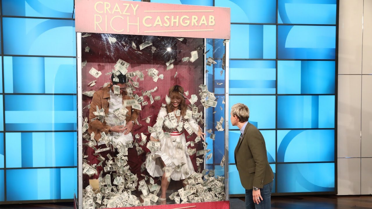 Constance Wu & Henry Golding Have a 'Crazy Rich Cash Grab'