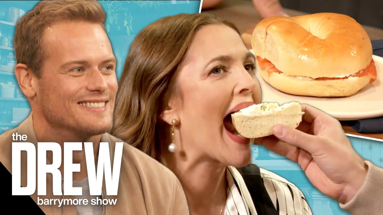 Sam Heughan Feeds Drew as She Helps Him Find the Best Bagel in NYC