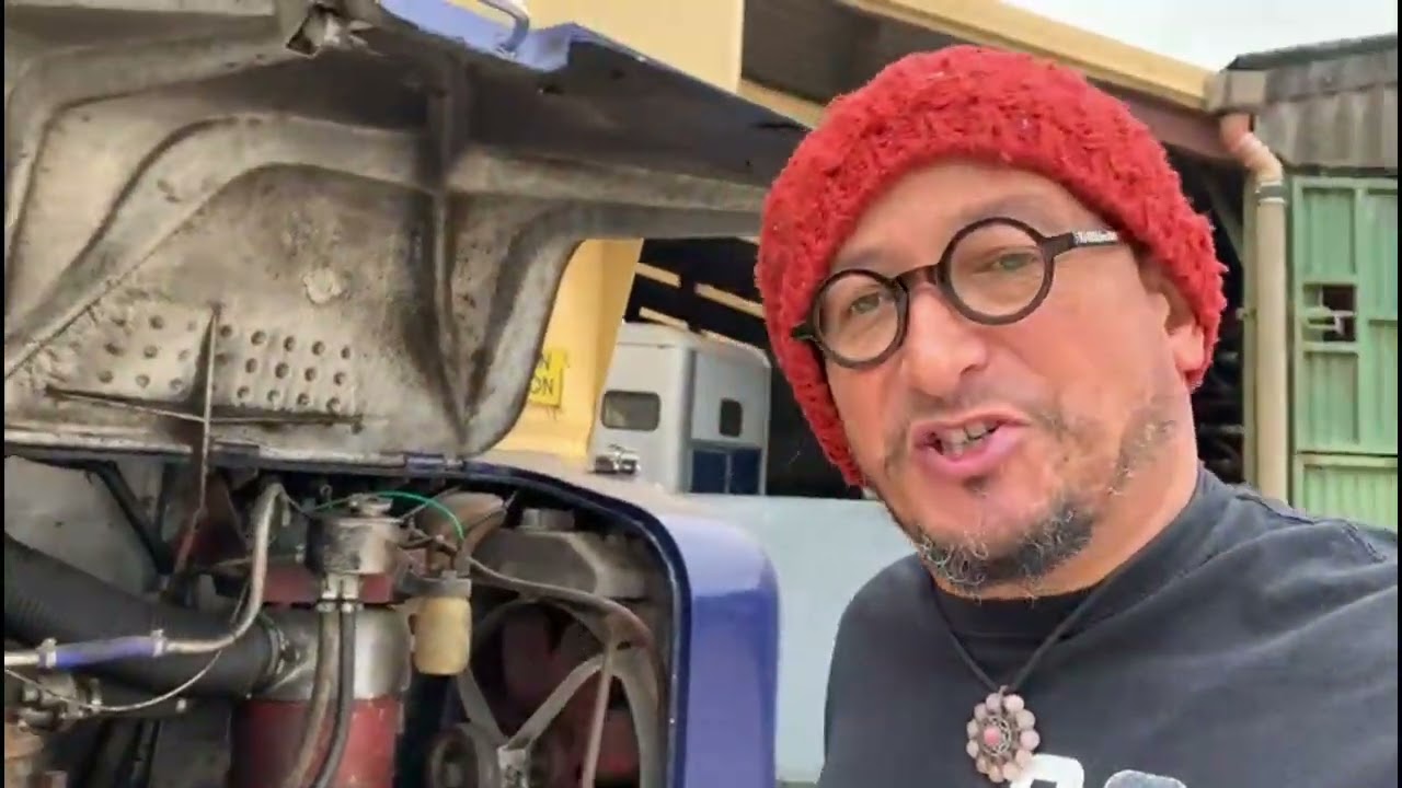 Fuzz shows how to start his bus before the bus show at the British Motor Museum on the 3rd of July