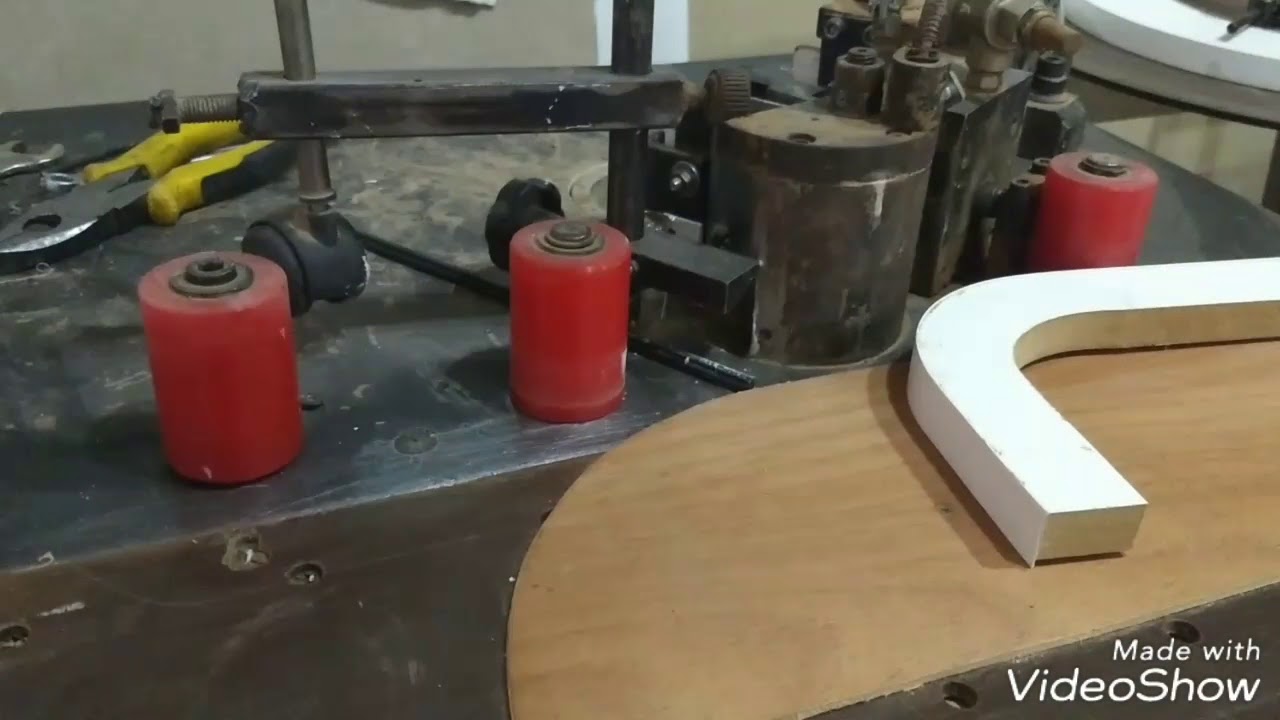 Fita de borda em peças curvas na encabecadeira.