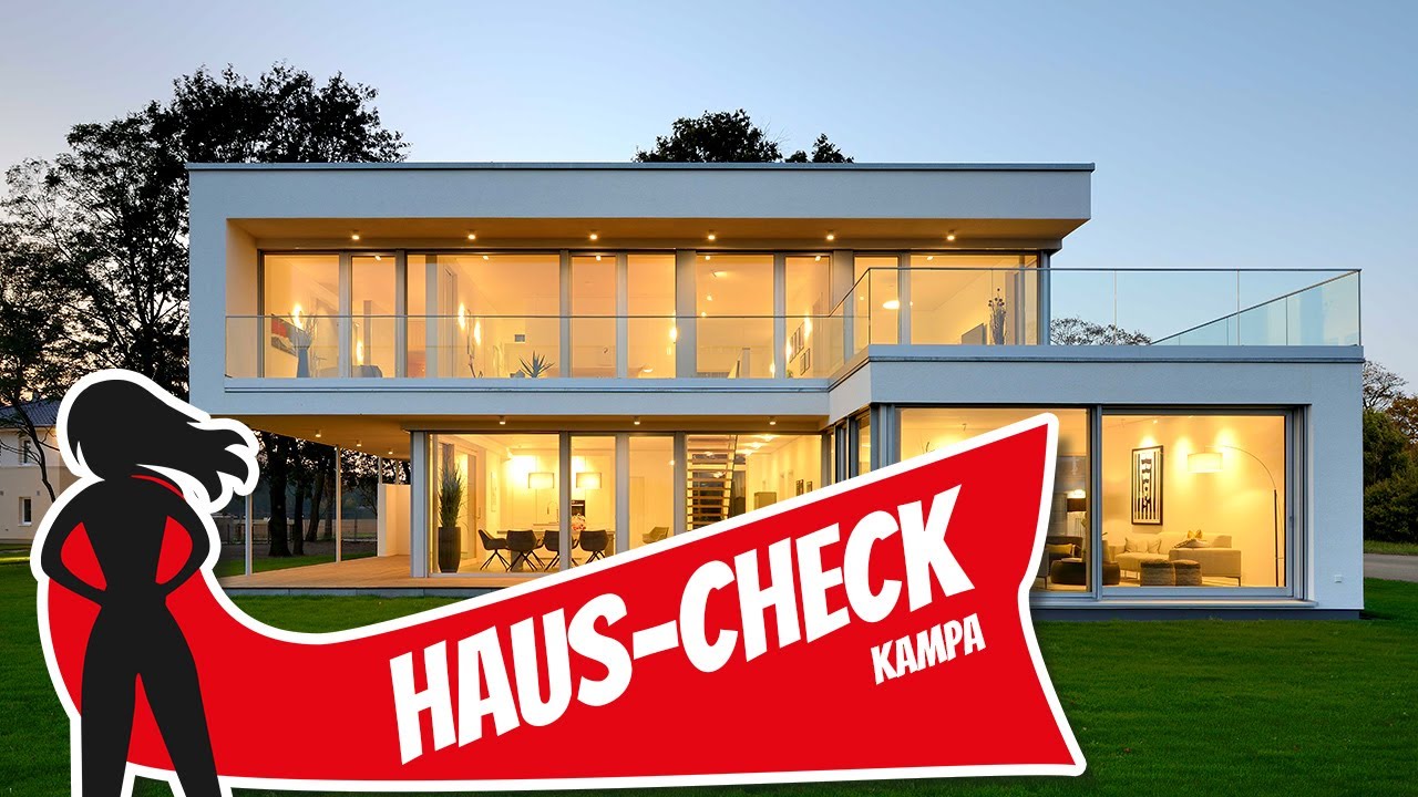 Haus-Check: Moderne Villa mit Flachdach im Bauhausstil von Kampa Haus | Hausbau Helden