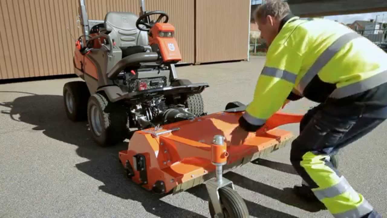 Learn how to attach a flail mower to a Husqvarna P 525D Front Mower