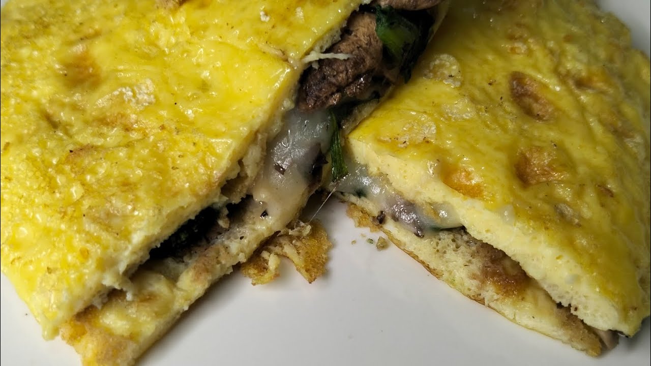 Omelette relleno de champiñones y espinacas 