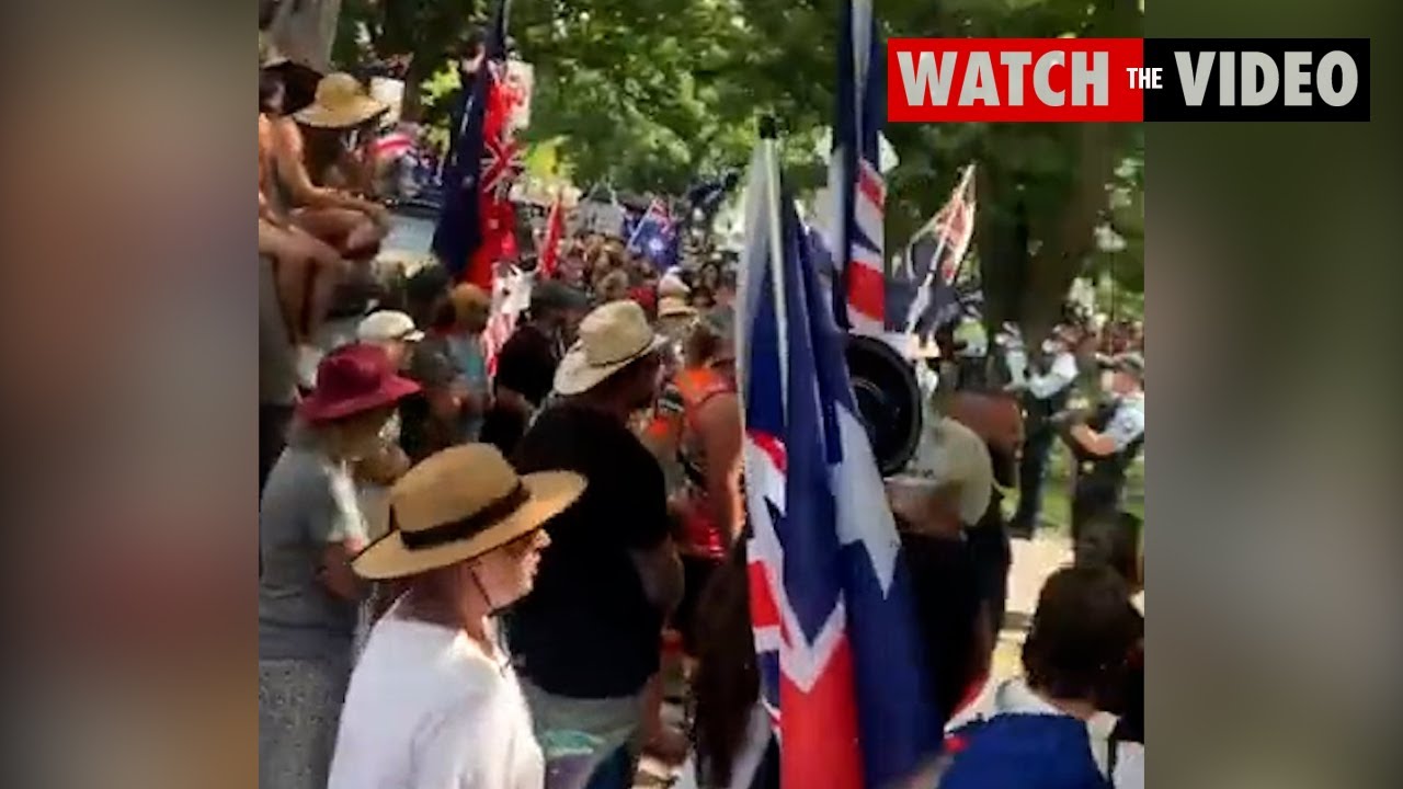 Anti vaccine protesters rally as Prime Minister delivers address in Canberra