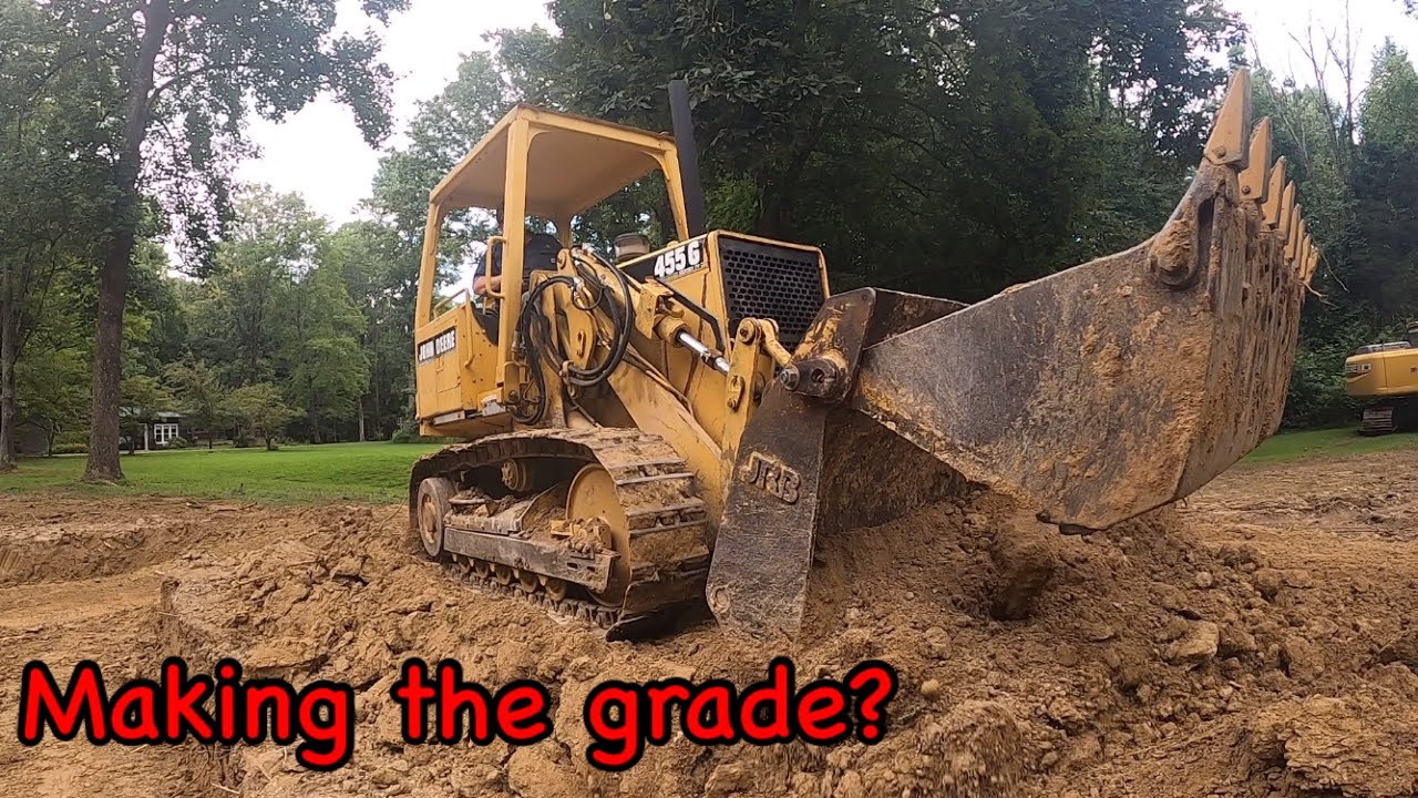 We put the John Deere 455G in the dirt! Cutting finish grade and moving dirt with 4n1 bucket