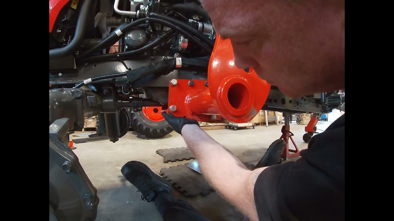 Installing the front end loader brackets on a Kubota lx2620