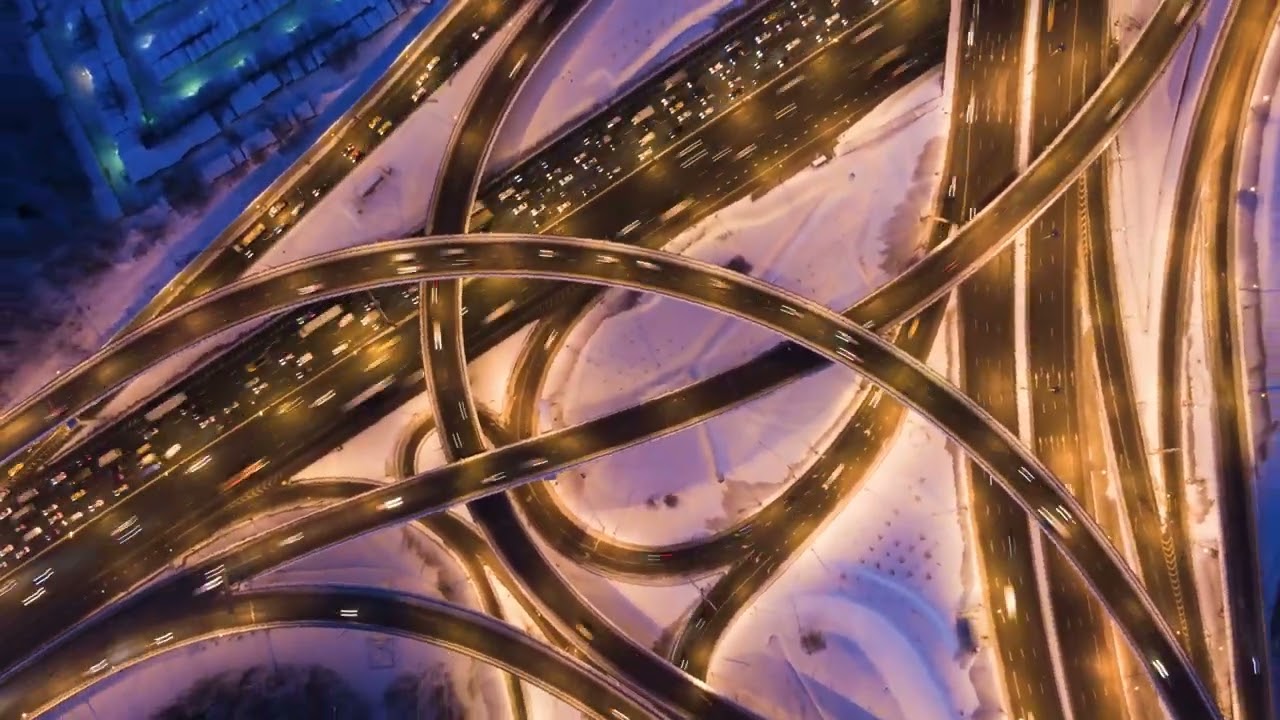 4K- lluminated Road Junction and cars traffic at wint | free footage