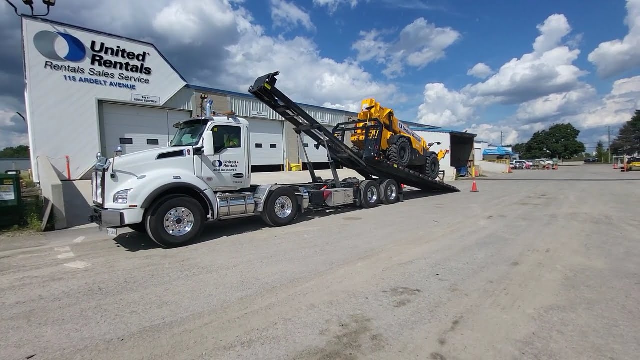 2025 Kenworth T880 with a simard Twinsteer With a Waltron Rolloff System