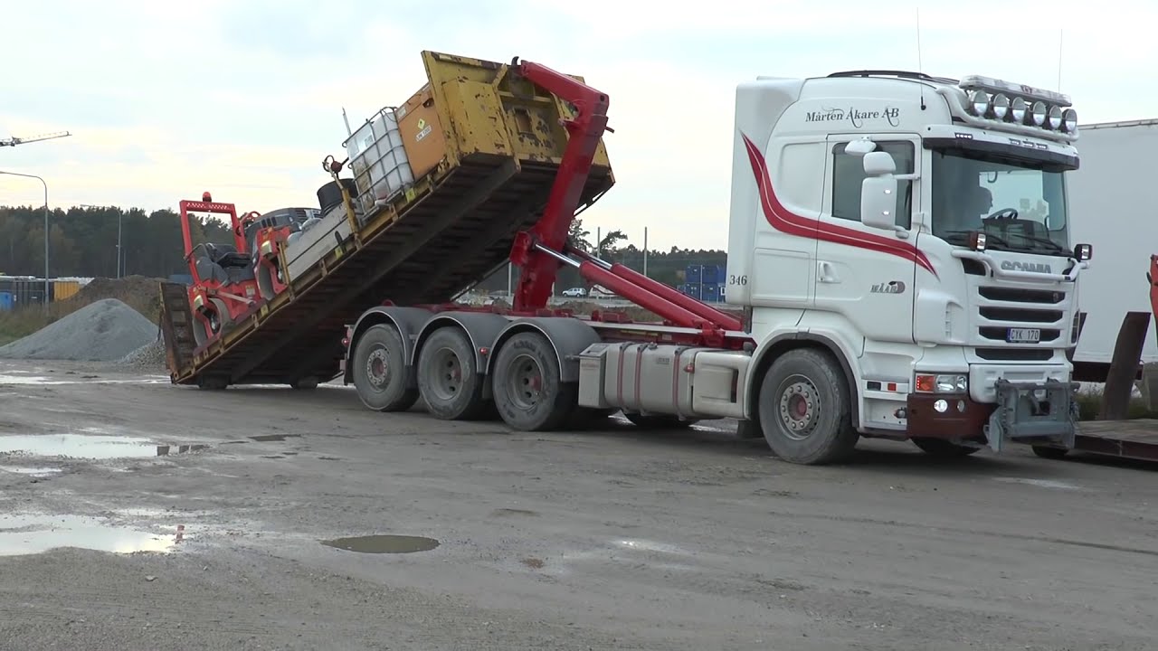 Scania hook lift loader machinery on a trailer 2013