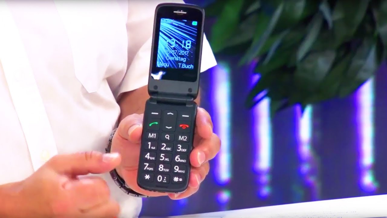 simvalley MOBILE Senioren- und Notruf-Klapp-Handy mit Garantruf Premium und Ladestation