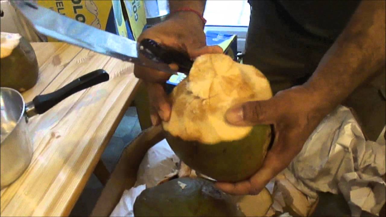How to cut open Young Green Coconuts without losing your fingers (demonstration by a Coconut Master)