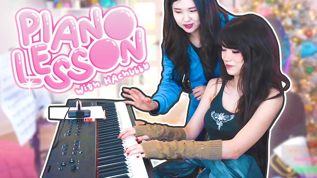 Teaching Emiru how to play piano!