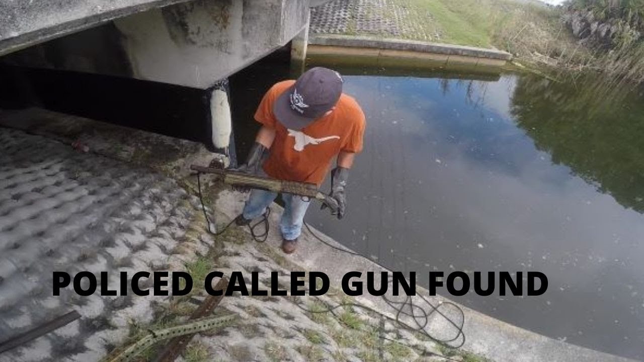 Police called magnet fishing.  Gun found.