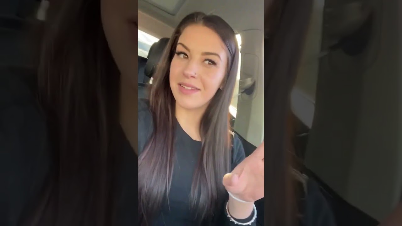 Girl smoking in the car - deep inhales!