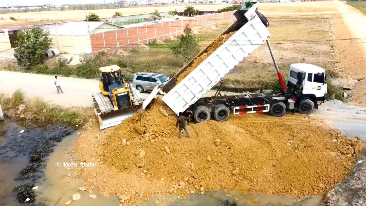 Great Job Showing Landfilling using Bulldozer SHANTUI DH17C2 and Heavy Dump truck unloading soil.