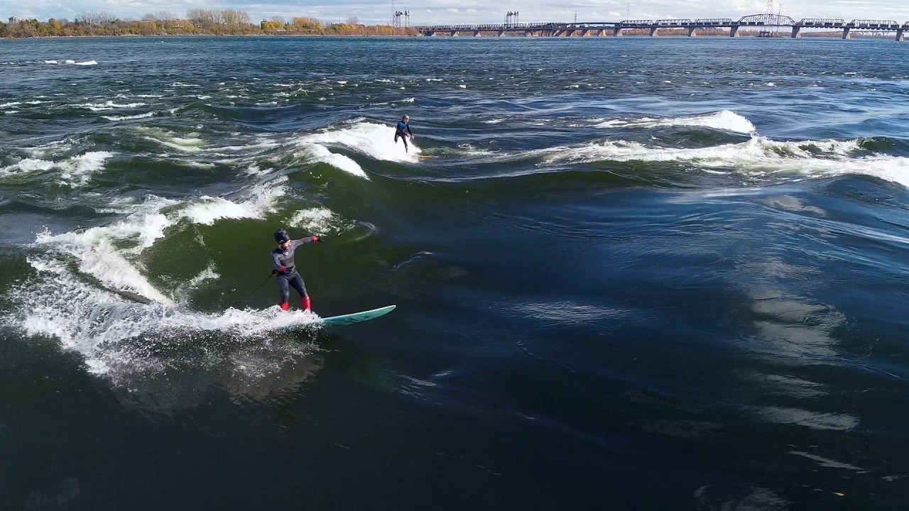 3 MINUTES on a HUGE River Wave! - River Surfing in Montreal - Full Drone Clip - Orion Surfs
