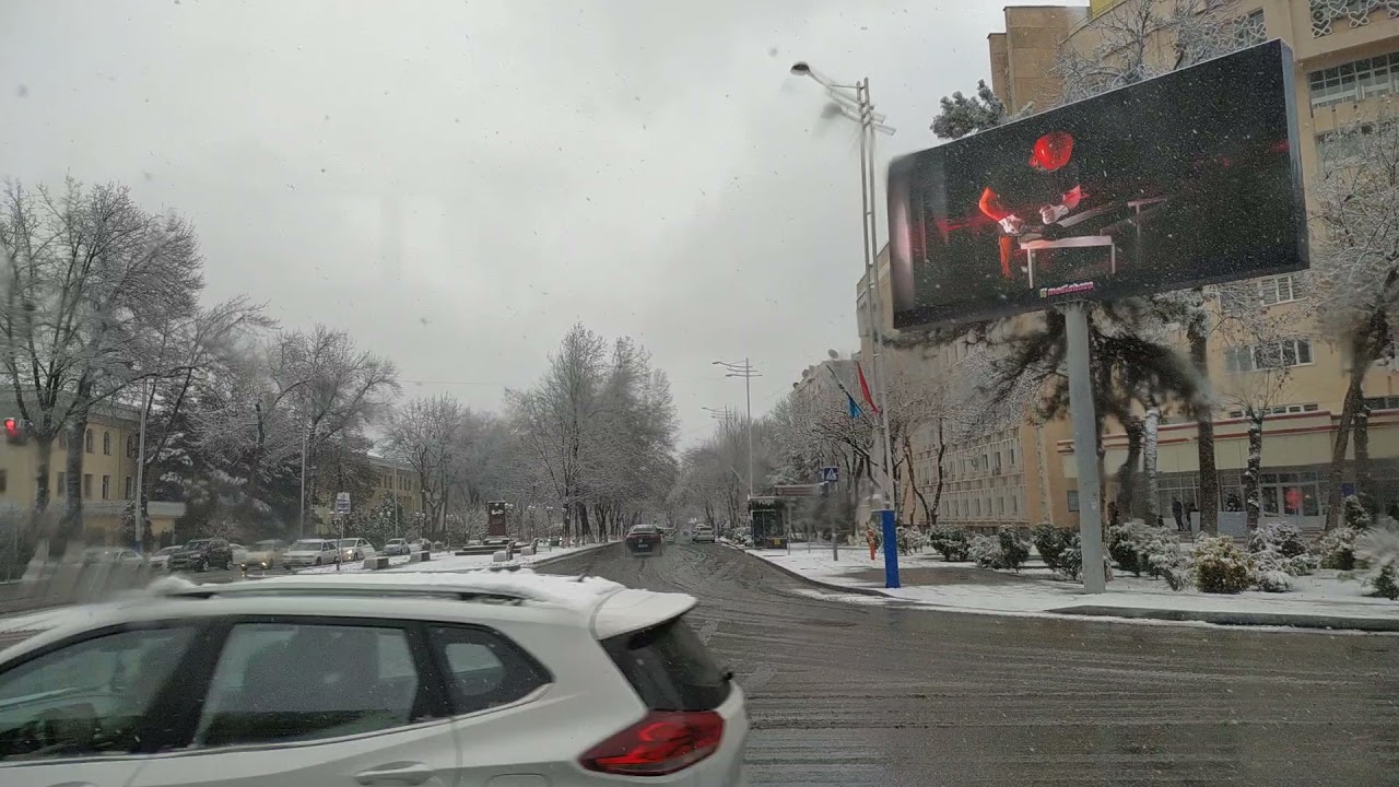 Зимний Ташкент. Поездка на 93 автобусе от Рисового базара до Юнусабада в снегопад.