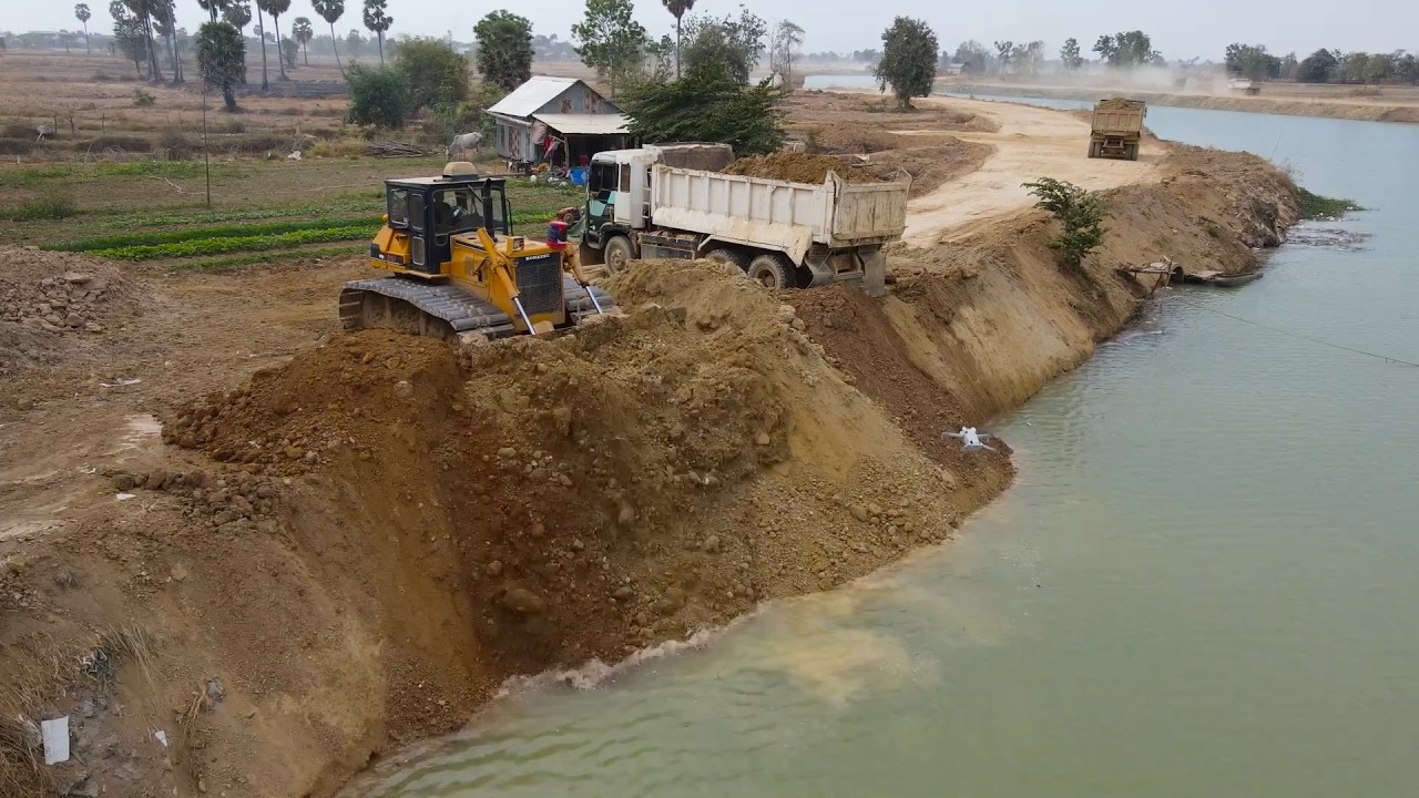 The Best Development Activities With Skill Operator build Road By Bulldozer D60p Push Land in canal