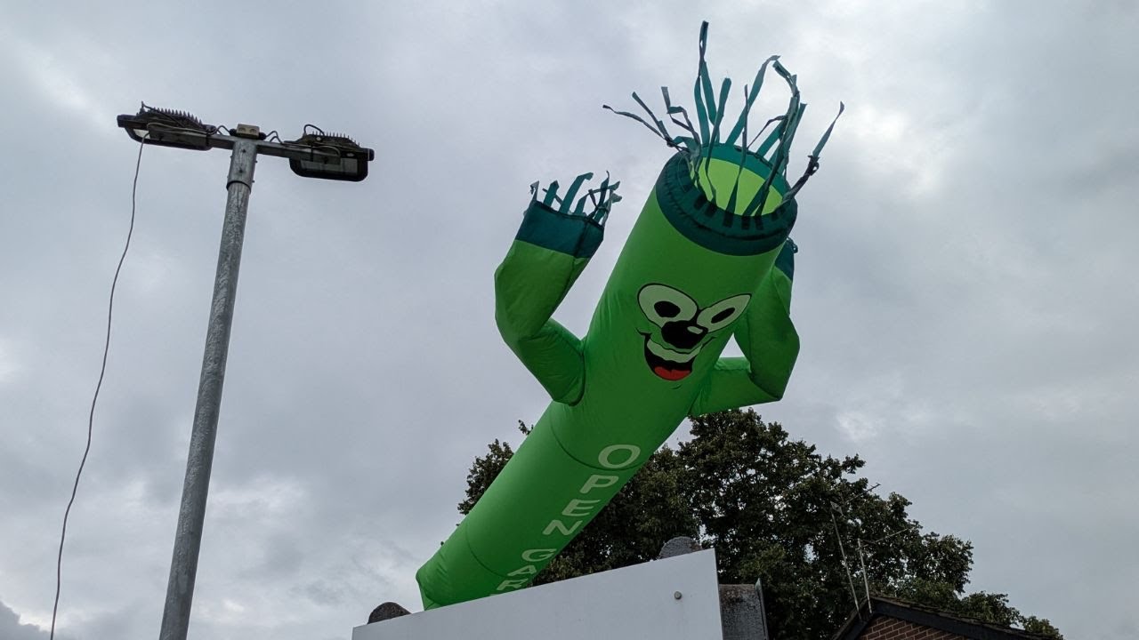 Wacky waving inflatable arm flailing tube man at Birch Garden Centre in Cheadle, Stockport
