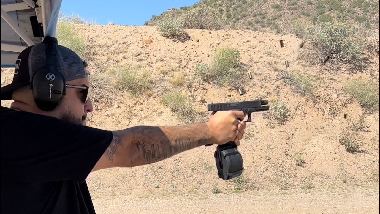 Glock 18c with the Magpul D-50 drum