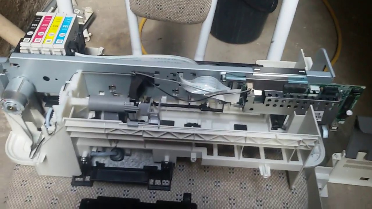 Como abrir a impressora Epson Stylus TX133