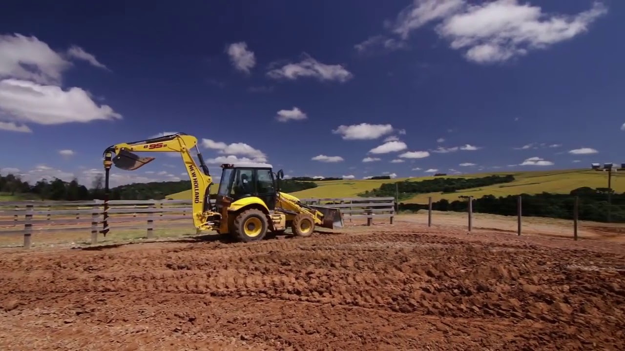 Retroescavadeira B95B New Holland  com perfuratriz