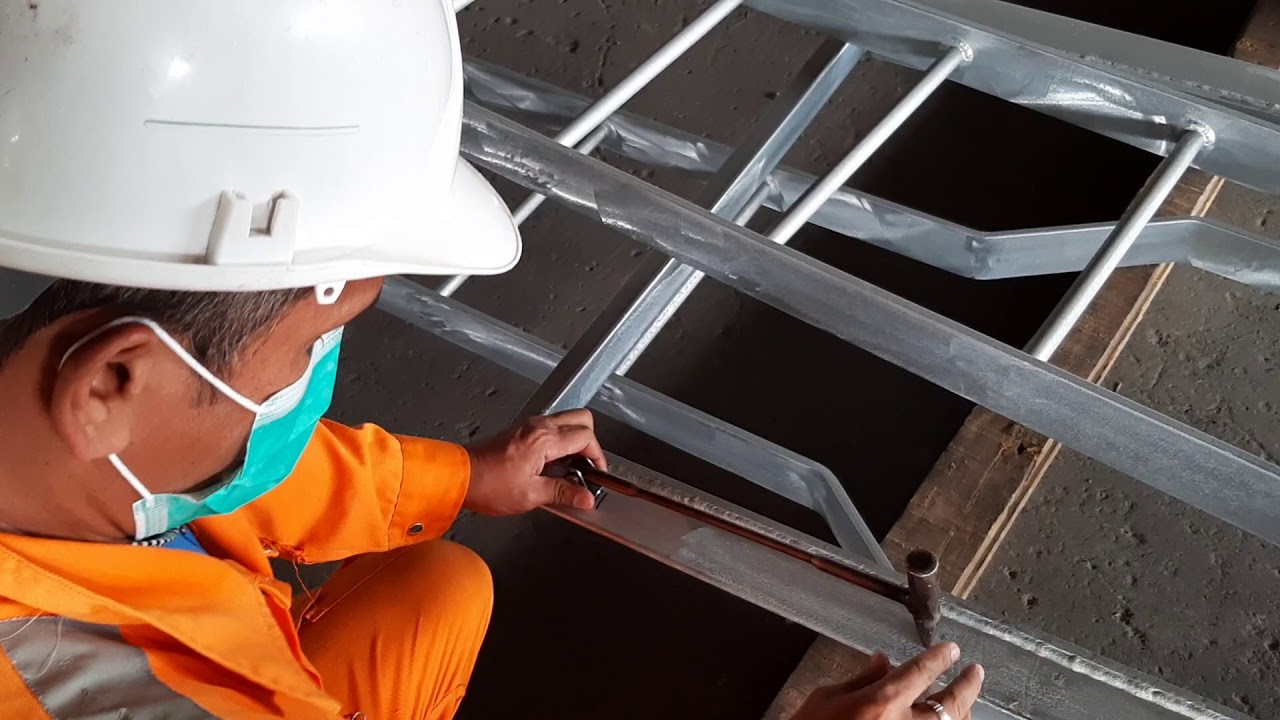 Hammer test performing for checking galvanized strength.