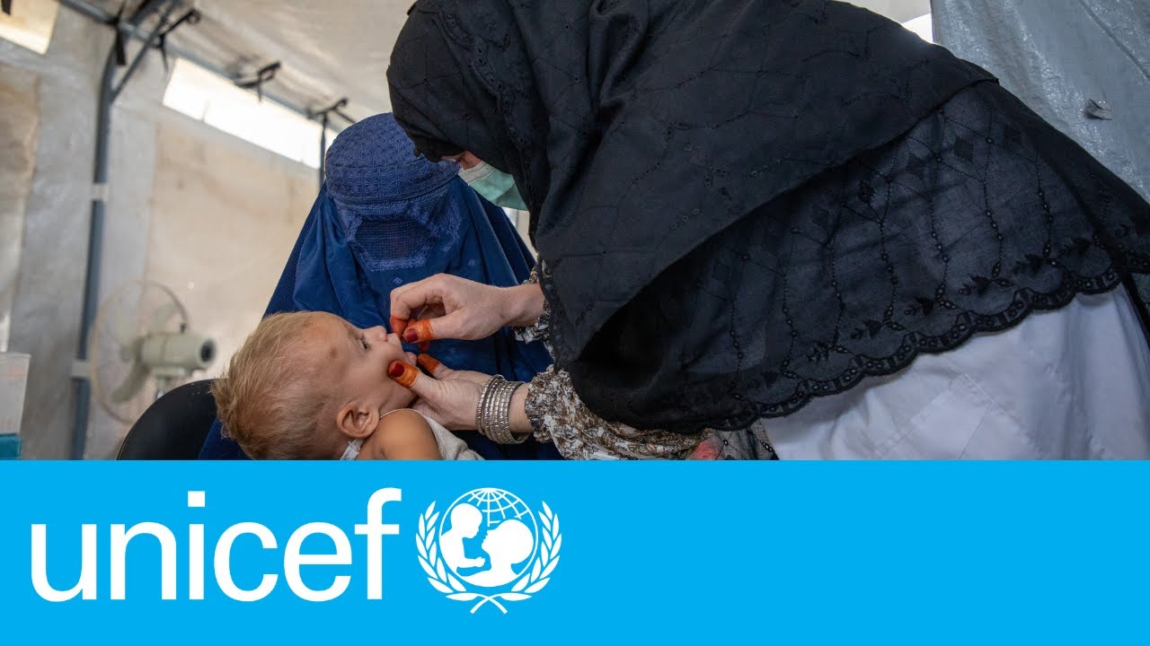 At the camp clinic, children are screened for malnutrition in 