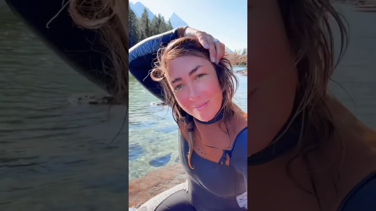 Free diving in a high alpine lake in Grand Teton National Park in August.