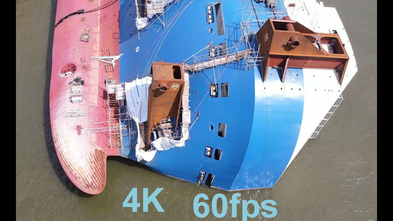 Flying over a large capsized cargo ship, St. Simons, GA, 4K 60fps