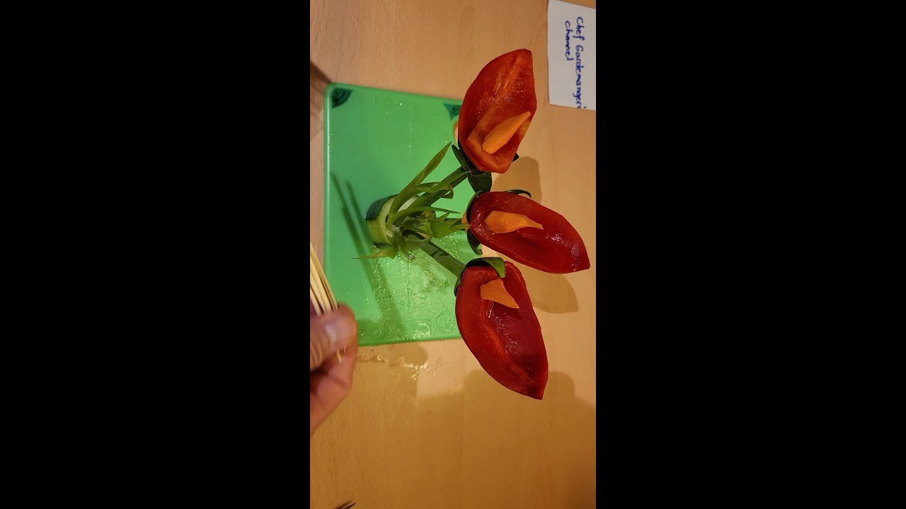 Flower garnish out of red bell pepper