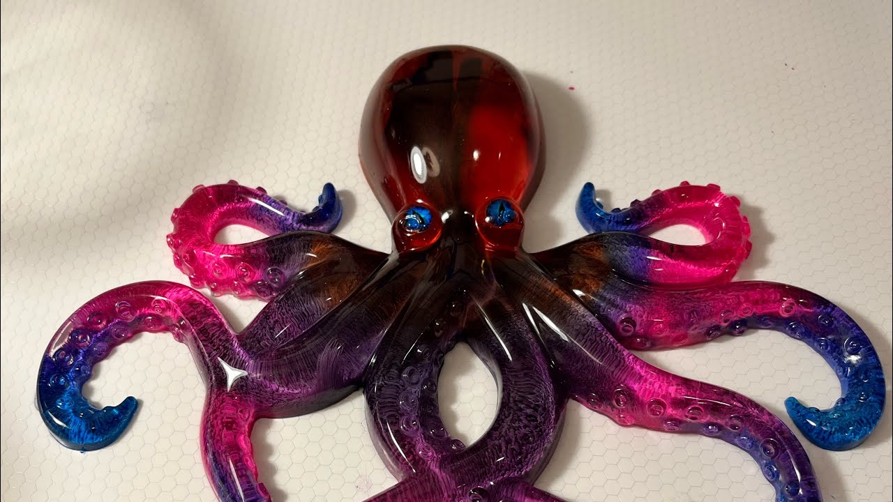 Resin pouring into an octopus 🐙 mold. #immortalcolors #artist #resinartwork #fluidart #homedecor