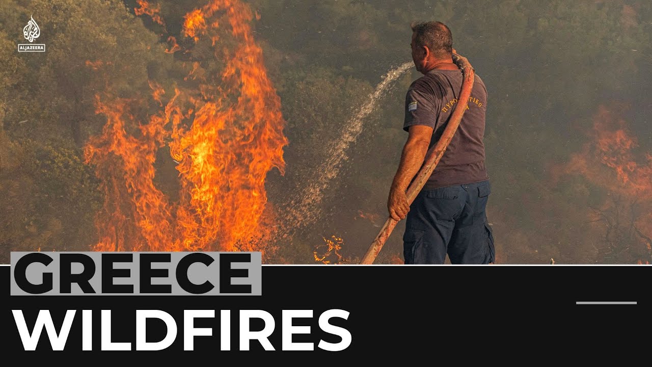 Thousands more people evacuated as high winds fan Greek wildfires