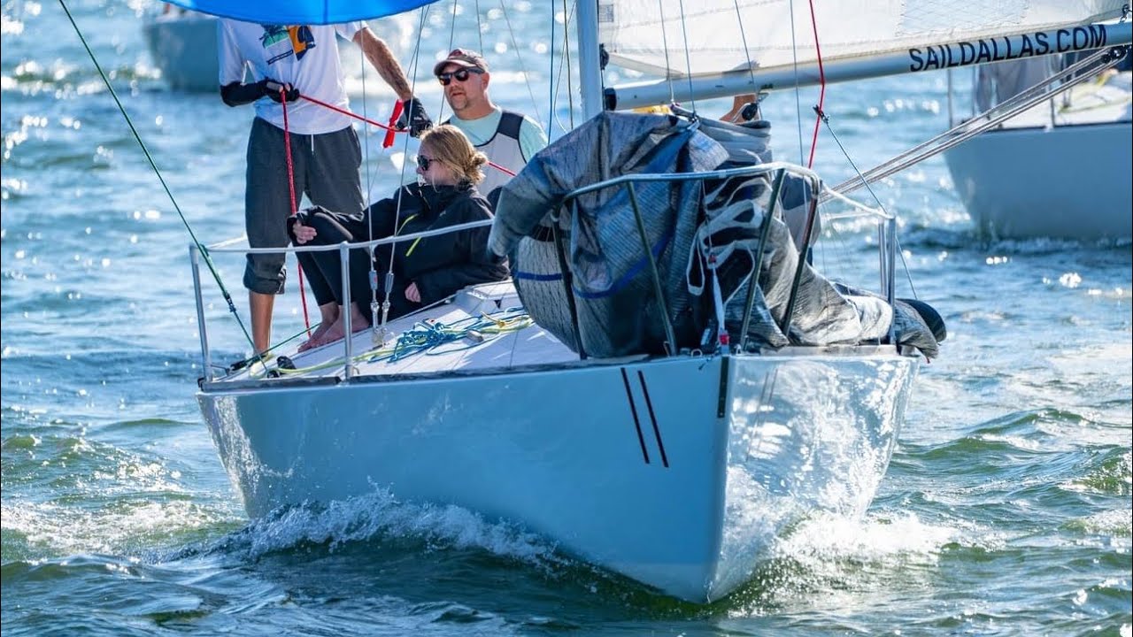 J24 club racing with shifty winds, onboard crew discussion and tactics.