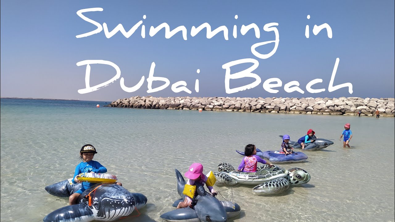 SWIMMING IN DUBAI BEACH WITH OUR GIANT INTEX SEA CREATURES
