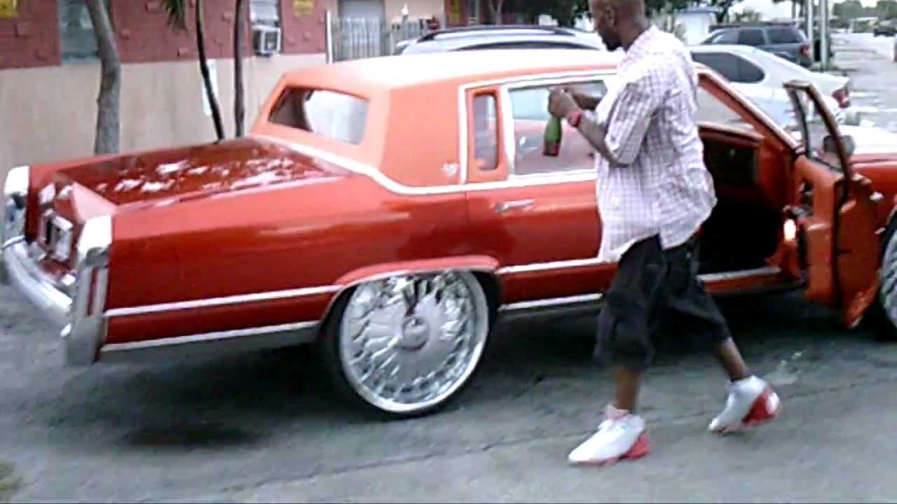 (PiefacePresentWhips)91 Candy Orange Cadillac Fleetwood On 26 DUB FLOATERS.AVI