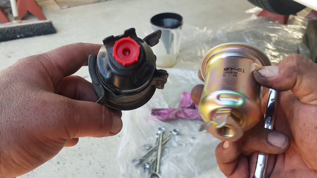 Mitsubishi lancer CE 4g93 fuel filter replacement.